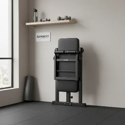 Flybird Adjustable Weight Bench folded for compact storage in a home gym setting.