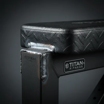 Close-up of Titan Fitness flat bench weld and upholstery texture for quality inspection